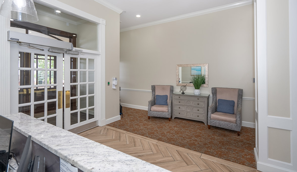 A view of the home lobby entrance, showcasing a stylish door and inviting decor.